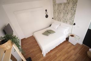 Posteľ alebo postele v izbe v ubytovaní Parigi Hotel bed and Breakfast