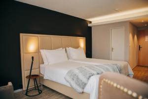 Hotel Dakota客房内的一张或多张床位