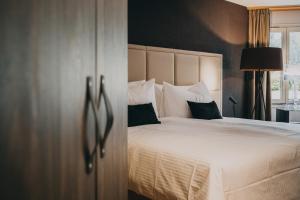 Hotel Dakota客房内的一张或多张床位