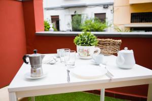 Príslušenstvo na prípravu kávy alebo čaju v ubytovaní Parigi Hotel bed and Breakfast