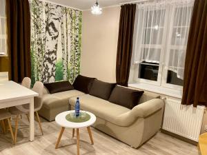 Posedenie v ubytovaní Apartamenty W Brzozowym Gaju