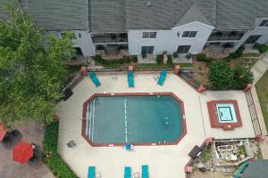 an overhead view of a swimming pool in a backyard at Wingate by Wyndham Valdosta/Moody AFB in Valdosta