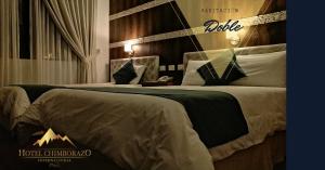 Postel nebo postele na pokoji v ubytování Hotel Chimborazo Internacional