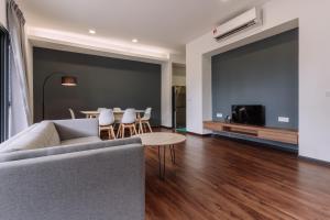 Posezení v ubytování Roxy Sematan Villa & Townhouse