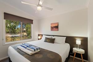 En eller flere senge i et værelse på Discovery Parks - Barossa Valley