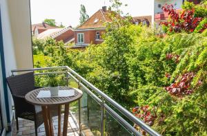 En balkong eller terrasse på Haus-Wiwibarg-OG