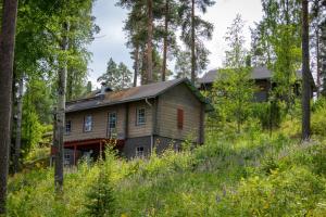 an old house in the woods at Rauhalahti Holiday Homes in Kuopio