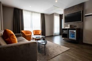 TV a/nebo společenská místnost v ubytování La Pieve Hotel
