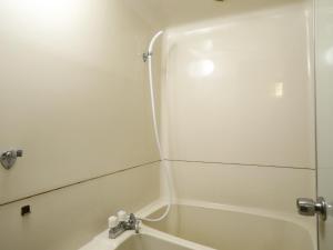 Koupelna v ubytování Hotel Umenoyu