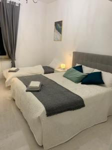En eller flere senger på et rom på Luxury Apartment in Rome Countryside - Francigena