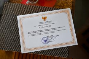 Certifikát, hodnocení, plakát nebo jiný dokument vystavený v ubytování Oxville Hotel