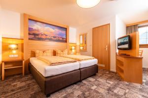 Letto o letti in una camera di Hotel-Garni Pramstraller