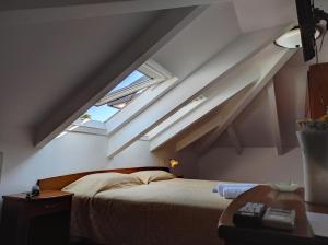 Posteľ alebo postele v izbe v ubytovaní Porto Lesvos hotel
