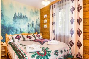 Posteľ alebo postele v izbe v ubytovaní Pałac Tatrzański Apartamenty