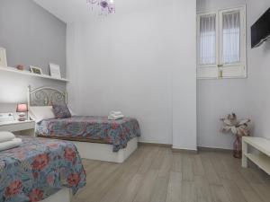 Postel nebo postele na pokoji v ubytování Caños de carmona Sevilla Centro