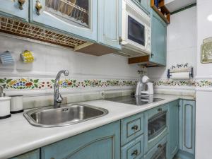 Kuchnia lub aneks kuchenny w obiekcie Sueños de Sevilla duplex a calidades