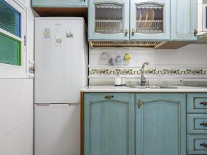 Kuchnia lub aneks kuchenny w obiekcie Sueños de Sevilla duplex a calidades