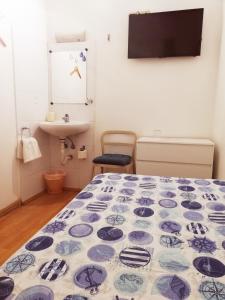 Postel nebo postele na pokoji v ubytování Hostal Felipe 2