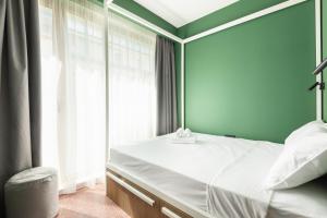Postel nebo postele na pokoji v ubytování Zeus is Loose Hostel