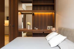Voodi või voodid majutusasutuse Amazing Piazza Venezia Suites toas