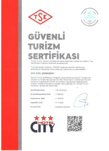 a white flyer with a red and white at Hotel City Cerkezkoy in Cerkezkoy
