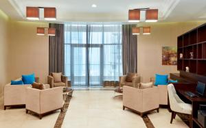 Ruang duduk di Best Plaza West Bay Hotel
