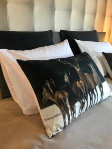 Ein Bett oder Betten in einem Zimmer der Unterkunft Le Chalet de Marguerite