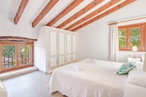 A bed or beds in a room at Finca El Clos