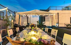 a table on a balcony with a white tent at 東京日和 in Tokyo