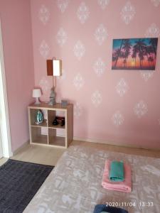 A bed or beds in a room at Karditsa Home Sweet Home 68 τ.μ