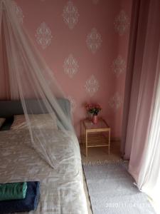 A bed or beds in a room at Karditsa Home Sweet Home 68 τ.μ