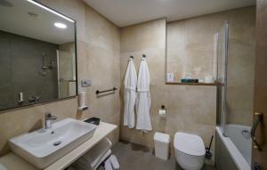 Koupelna v ubytování Grand Hotel BELLEVUE