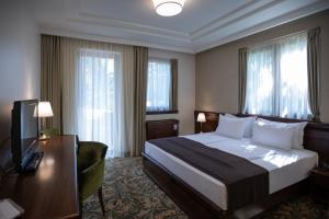 Letto o letti in una camera di Hotel & Spa PALIĆ RESORT