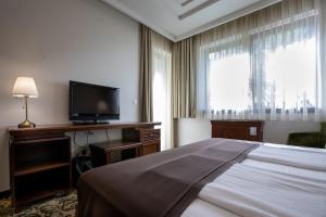 Letto o letti in una camera di Hotel & Spa PALIĆ RESORT