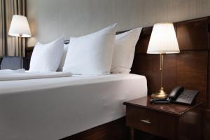 Letto o letti in una camera di Hotel & Spa PALIĆ RESORT