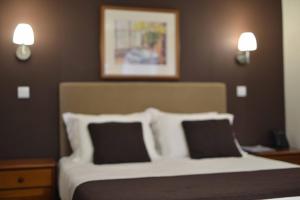 Postel nebo postele na pokoji v ubytování Hotel Salgueiro