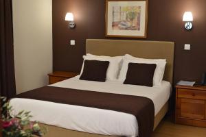 Postel nebo postele na pokoji v ubytování Hotel Salgueiro
