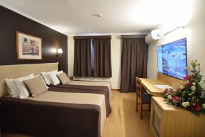 TV a/nebo společenská místnost v ubytování Hotel Salgueiro