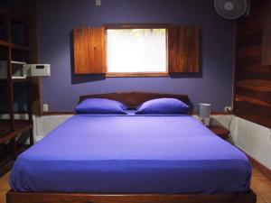 Ein Bett oder Betten in einem Zimmer der Unterkunft Casa Moabi