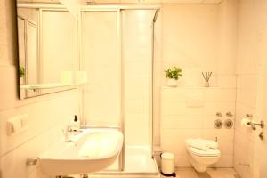 Bathroom sa Modernes Loft-Apartment im Herz von Kassel mit Netflix