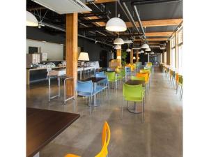 a row of chairs and tables in a cafeteria at OGAL INN - Vacation STAY 01855v in Akaishi