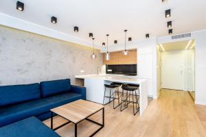 Kuchyňa alebo kuchynka v ubytovaní Super-Apartamenty International Fair