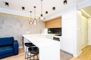 Kuchyňa alebo kuchynka v ubytovaní Super-Apartamenty International Fair