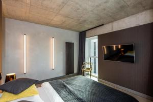 Posteľ alebo postele v izbe v ubytovaní Super-Apartamenty International Fair