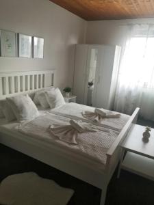 Postel nebo postele na pokoji v ubytování Rodinný penzion Barborka
