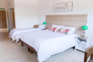 Katil atau katil-katil dalam bilik di Posada del Manzano