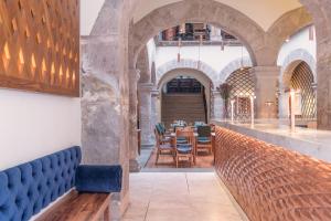 Posezení v ubytování Hotel Herencia By Hosting House