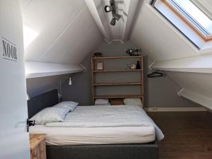 Ένα ή περισσότερα κρεβάτια σε δωμάτιο στο KoksenCo