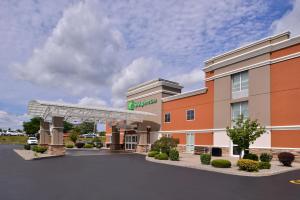 a rendering of a hotel with a parking lot at Holiday Inn Hotel & Suites Rochester - Marketplace, an IHG Hotel in Rochester