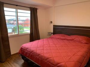 Voodi või voodid majutusasutuse Dúplex de categoría a una cuadra de la playa toas